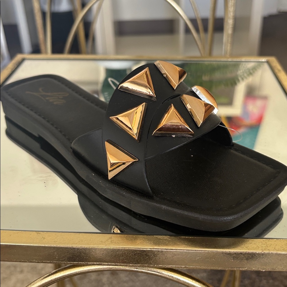 Chic Black Sandals with Gold Accents